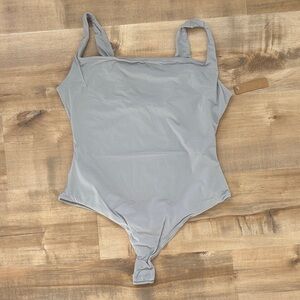 SKIMS Fits Everybody Square Neck Thong Bodysuit in Moonstone
